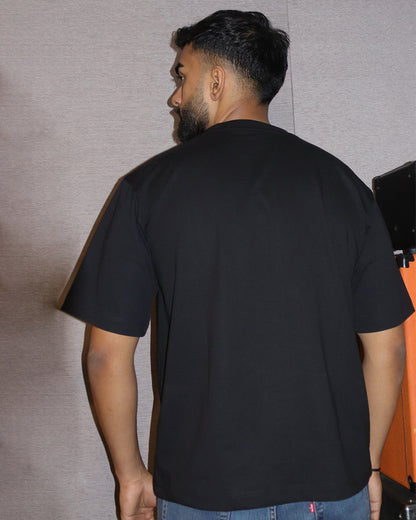 man wearing a black tshirt 